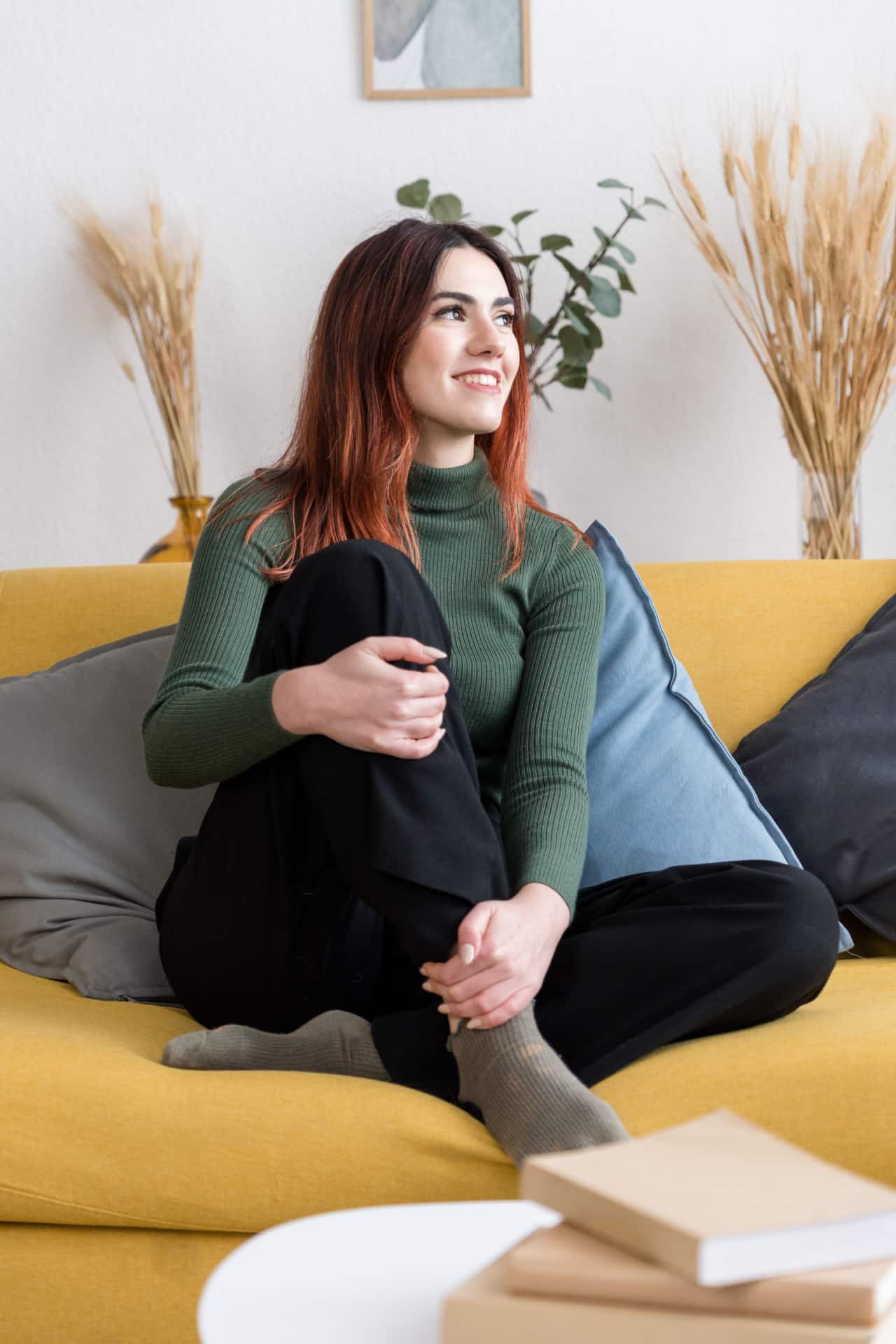 woman sitting on couch